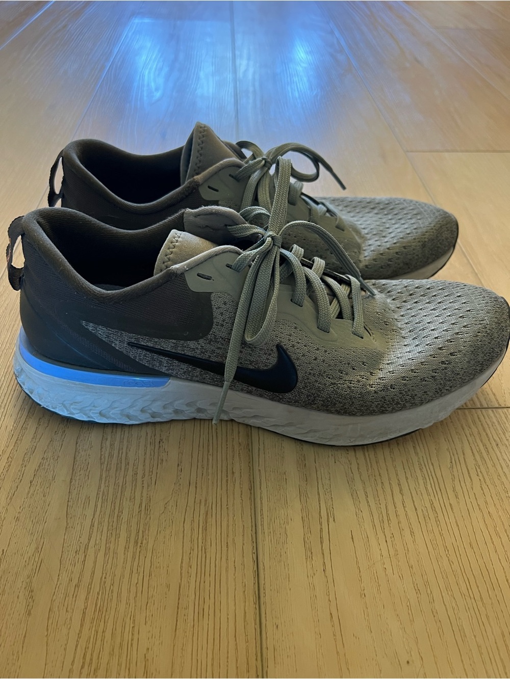 Nike Women’s Running Shoes in Gray with Blue and Orange Accents